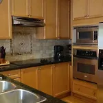 Bright Studio W Full Kitchen And Detached Bathroom