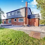 Stunning 7 Bedroom Rougeview Home With 2 Kitchens, 5 Bathrooms, Amazing Backyard & 8-Car Parking