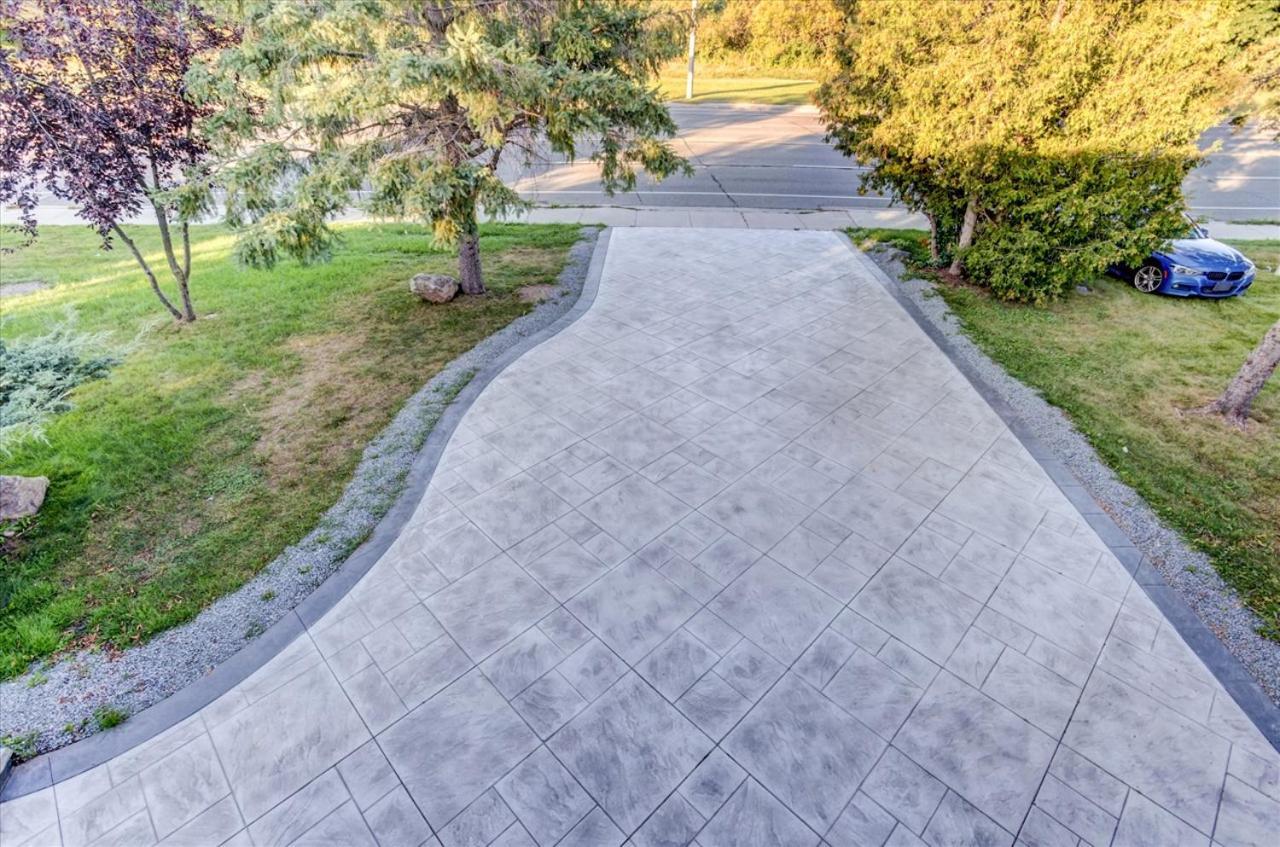 Stunning 7 Bedroom Rougeview With 2 Kitchens, 5 Bathrooms, Amazing Backyard & 8-car Parking Toronto